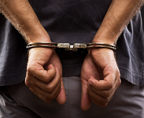 a handcuffed man